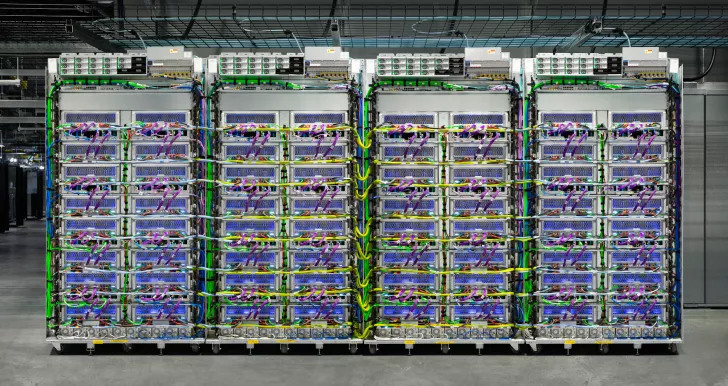 Computer servers with interconnected cables in a data center.