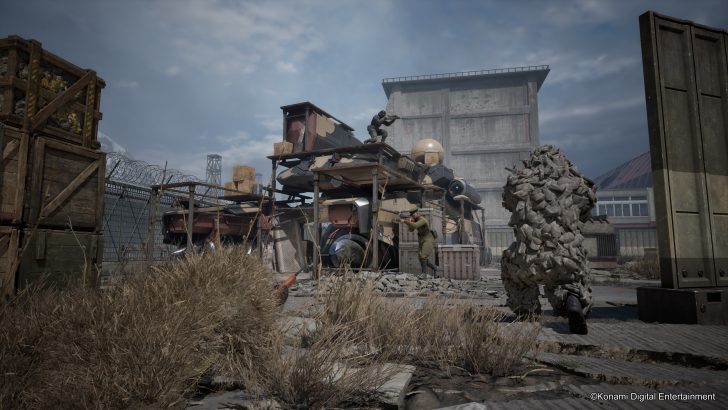 A soldier in camouflage aims a gun near a large machine while another crouches on a platform in a post-apocalyptic setting.