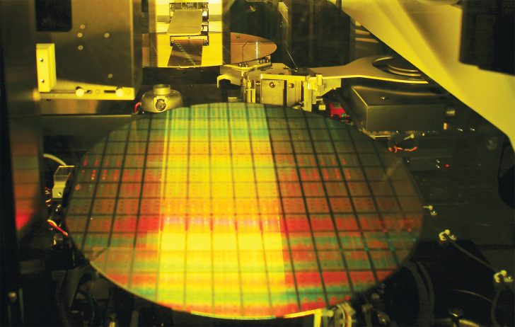Silicon wafer inside a semiconductor manufacturing machine.