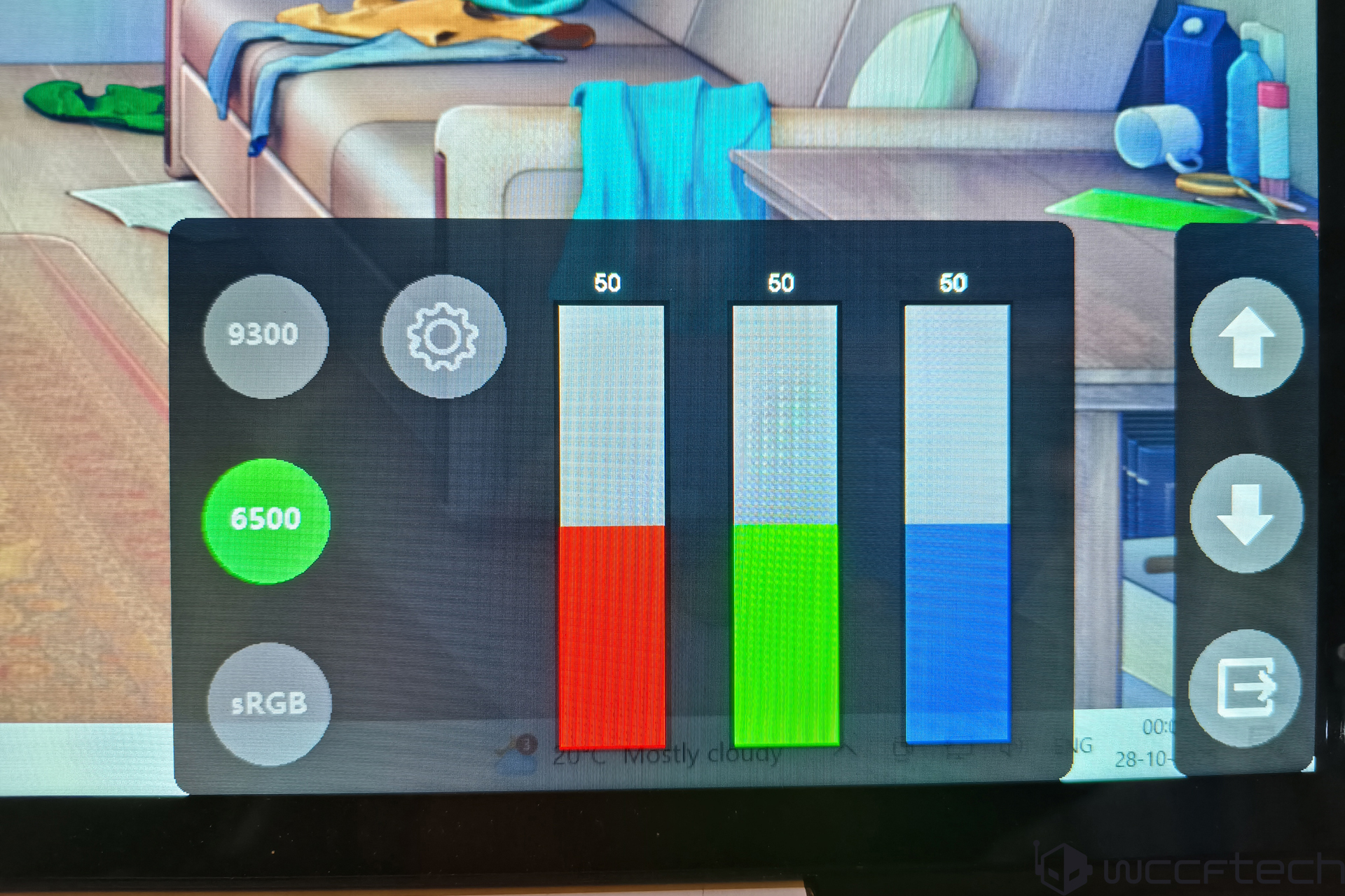 Color settings display showing 6500 selected and RGB values at 50 on a monitor screen in a living room.