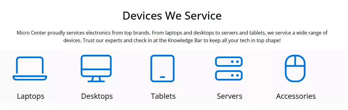 Icons for 'Laptops,' 'Desktops,' 'Tablets,' 'Servers,' and 'Accessories' under the heading 'Devices We Service' at Micro Center.
