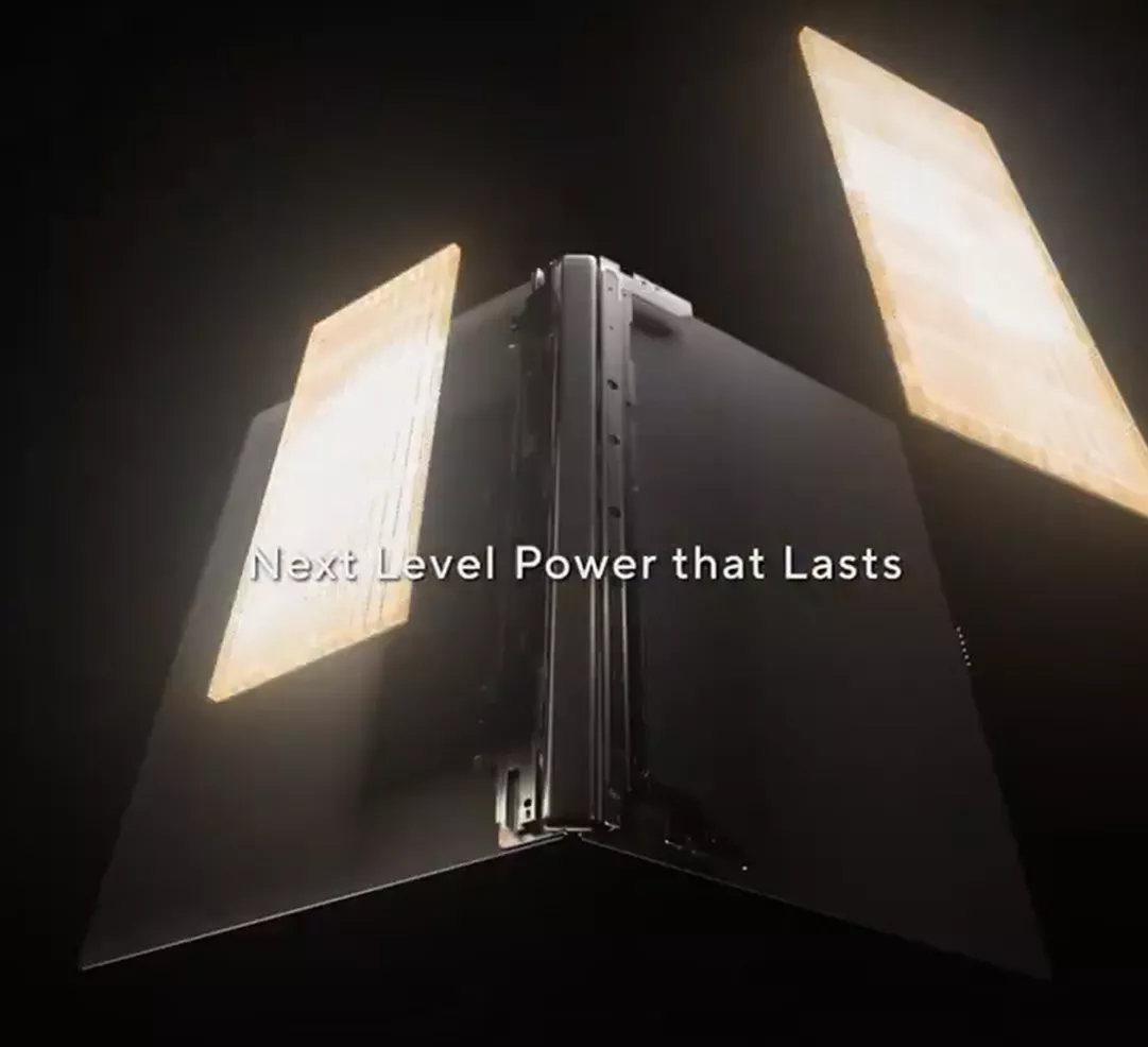 The image shows a sleek, partially visible laptop with illuminated side panels and the text 'Next Level Power that Lasts' prominently displayed in front.