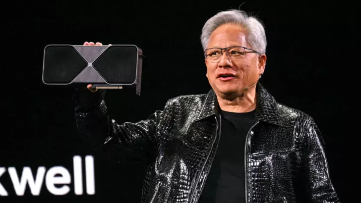 A person holding an NVIDIA graphics card, with the text 'xwell' partially visible in the background.