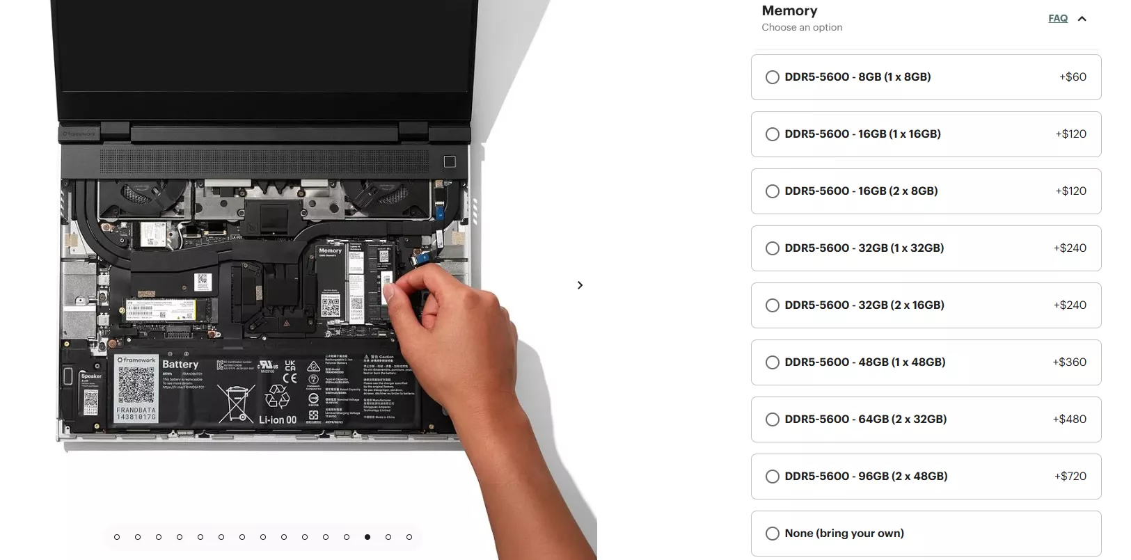 A person installs memory in a Framework laptop's open internal compartment, with a 'Memory' label visible on the module.