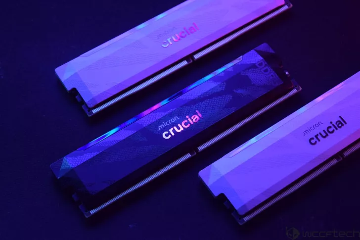 Micron Crucial DDR5 memory modules in a purple lighting setup.