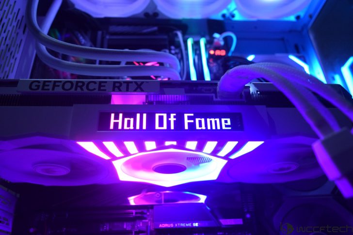 NVIDIA GeForce RTX graphics card with Hall Of Fame and AORUS XTREME readouts in a PC setup.
