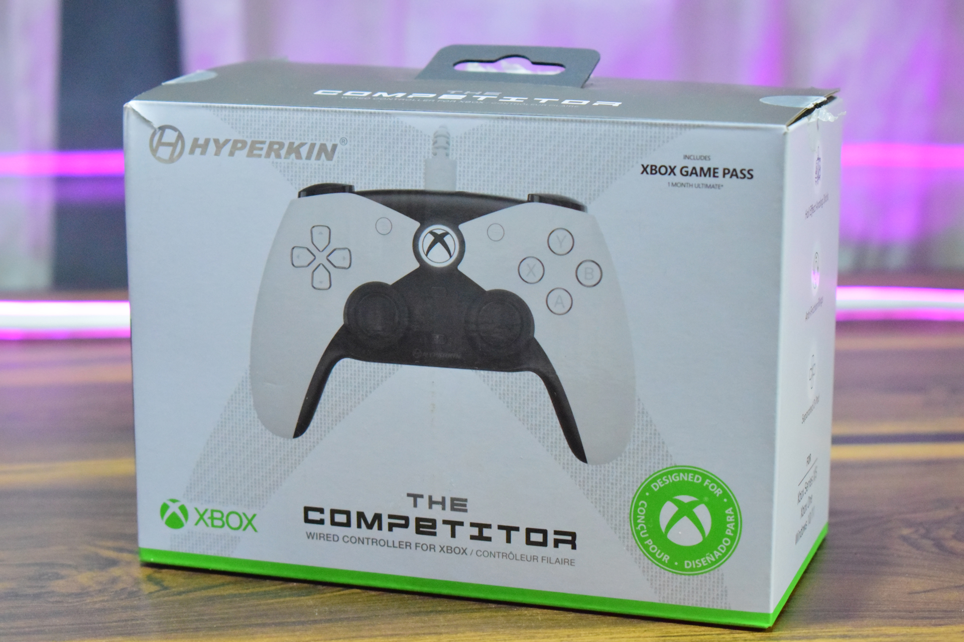 The image shows a Hyperkin The Competitor wired controller for Xbox, with packaging that includes 'Xbox Game Pass.'