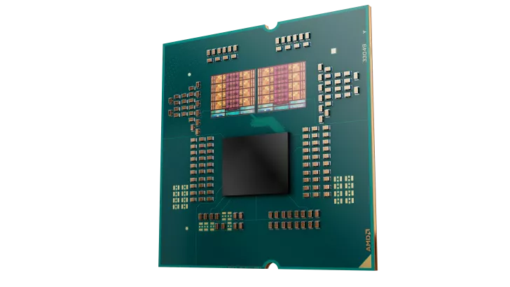 A close-up view of an AMD processor chip showing intricate circuitry and the AMD logo on the bottom corner.