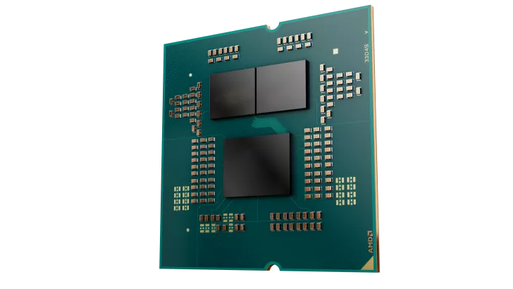 A close-up of an AMD processor with multiple visible components on its surface and the AMD logo in the corner.