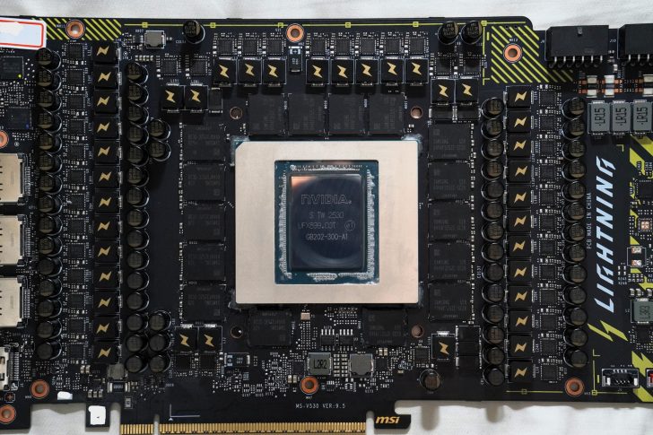 A close-up of an MSI graphics card featuring an NVIDIA processor marked 'UFX899_COT'.